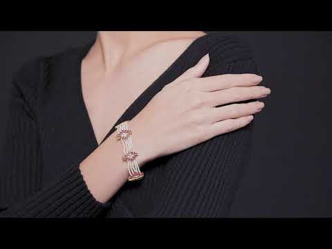 Bracelet with Rubies, Emeralds and Pearls in 22k Gold.